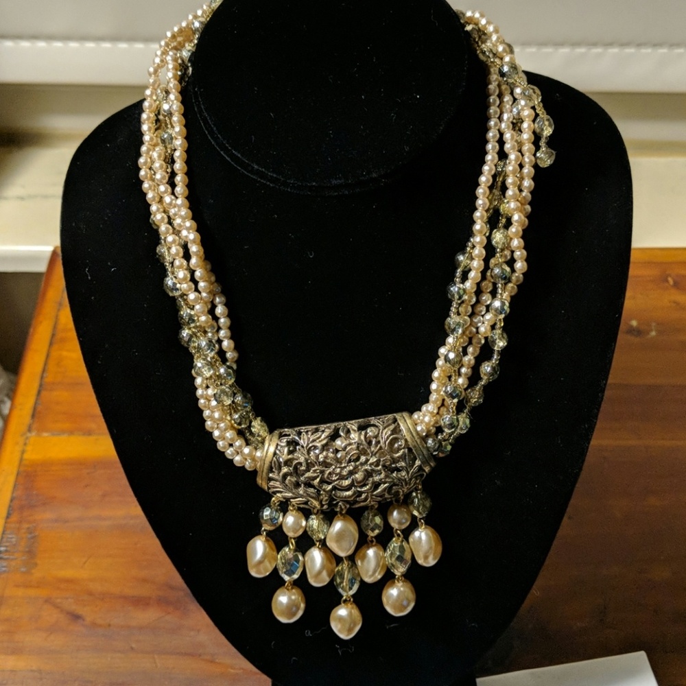 Necklace with beads (beads are a beige color)